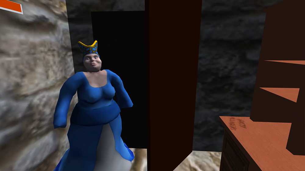 A fat woman wearing a fancy medieval hat glares from the corner of a room with stone walls.  There is a doorway behind her and a shelf unit with graffiti on it in front of her.